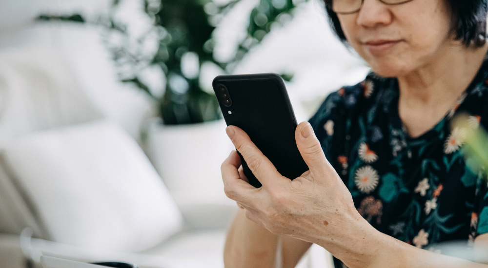 Woman looking at her mobile phone